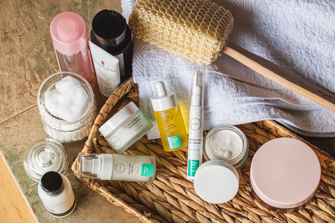 A serene bathroom countertop with skincare products neatly arranged, including cleansers, moisturizers, and serums, with soft natural lighting.